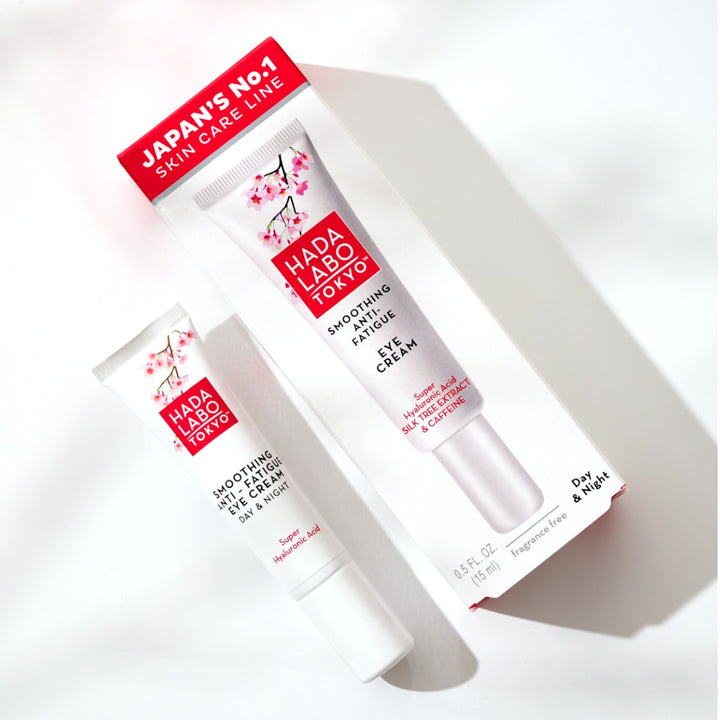 Hada Labo Smoothing Anti-Fatigue Eye Cream 15ml tub och fråga mot vit bakgrund.